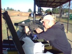 03-17-09_1813 Micah Hall sites his M4 variant.