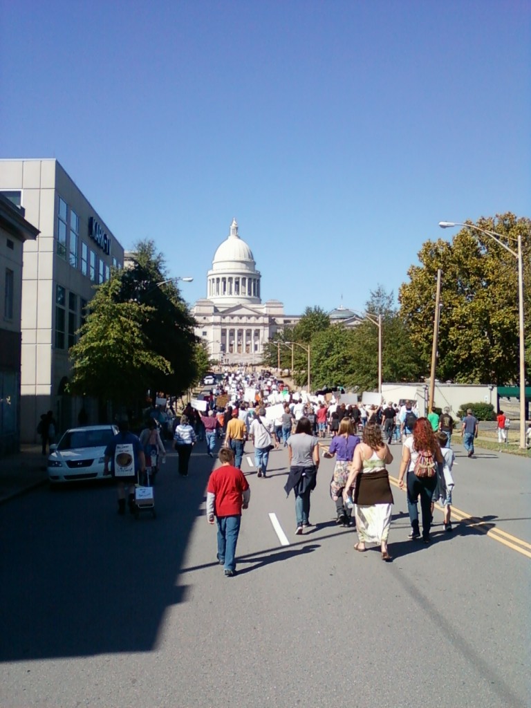 Protesters move in a wave toward the State Capitol. (photo by Sitton)